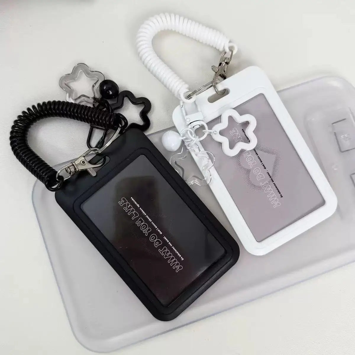 colorful star-shaped retractable plastic ID card holder with keychain. Cute and practical, suitable for bus cards, campus ID,